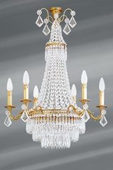 Lustre en cristal de bohème vieil or Louis XVI neuf lumières . Lucien Gau. Lustre en cristal de bohème vieil or Louis XVI neuf lumières . Lucien Gau.