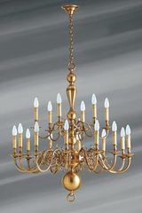 Lustre en laiton style hollandais dix-huit lumières . Lucien Gau. Lustre en laiton style hollandais dix-huit lumières . Lucien Gau.
