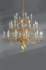 Lustre hollandais laiton trente lumières . Lucien Gau. Lustre hollandais laiton trente lumières . Lucien Gau.