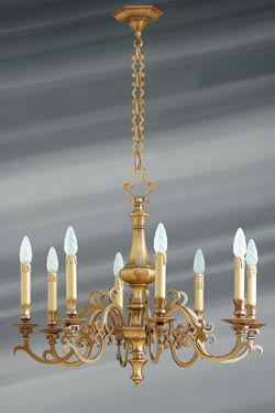 Lustre Louis XIII bronze massif huit lumières. Lucien Gau. 