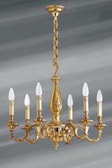 Lustre Louis XIV bronze massif vieil or six lumières. Lucien Gau. Lustre Louis XIV bronze massif vieil or six lumières. Lucien Gau.