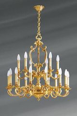 Lustre Louis XV dix-huit lumières patine vieil or. Lucien Gau. Lustre Louis XV dix-huit lumières patine vieil or. Lucien Gau.