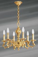 Lustre Louis XV doré en bronze six lumières. Lucien Gau. Lustre Louis XV doré en bronze six lumières. Lucien Gau.