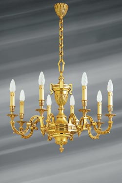 Lustre Louis XVI en bronze doré, huit lumières. Lucien Gau. 