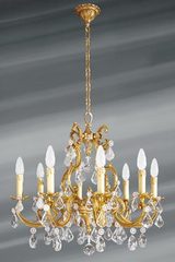 Lustre à pampilles cristal de bohème bronze patiné vieil or 8 lumières. Lucien Gau. Lustre à pampilles cristal de bohème bronze patiné vieil or 8 lumières. Lucien Gau.
