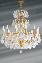 Lustre à pampilles en cristal de bohème Louis XV douze lumières . Lucien Gau. Lustre à pampilles en cristal de bohème Louis XV douze lumières . Lucien Gau.