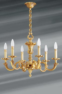 Lustre à six bougeoirs en bronze doré Louis XV. Lucien Gau. 