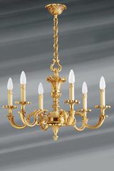 Lustre à six bougeoirs en bronze doré Louis XV. Lucien Gau. Lustre à six bougeoirs en bronze doré Louis XV. Lucien Gau.