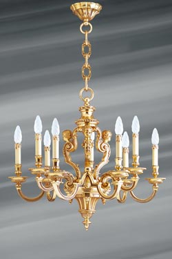 Lustre style Louis XIV en bronze doré neuf lumières. Lucien Gau. 