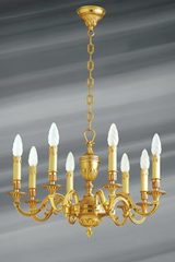 Lustre style Louis XVI, bronze doré, huit lumières, feuilles et perles . Lucien Gau. 