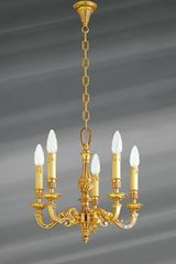 Petit lustre Louis XVI en bronze doré, cinq lumières. Lucien Gau. 