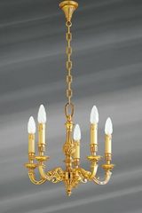 Petit lustre Louis XVI en bronze doré, cinq lumières. Lucien Gau. Petit lustre Louis XVI en bronze doré, cinq lumières. Lucien Gau.