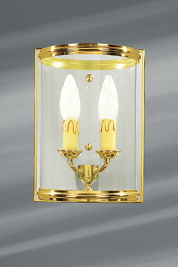 Petite applique de style classique en verre cylindrique et bronze massif. Lucien Gau. 