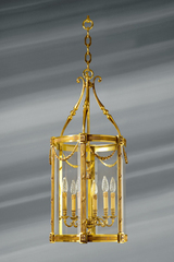 Très grande lanterne classique en bronze et verre six lumières. Lucien Gau. Très grande lanterne classique en bronze et verre six lumières. Lucien Gau.
