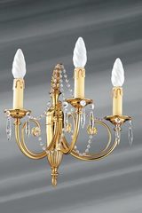 Bohemian crystal and solid bronze sconce three lights. Lucien Gau. 