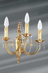 Bohemian crystal and solid bronze sconce three lights. Lucien Gau. Bohemian crystal and solid bronze sconce three lights. Lucien Gau.