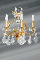 Gold Louis XV wall lamp with trimmings in bohemian crystal 3 lights. Lucien Gau. Gold Louis XV wall lamp with trimmings in bohemian crystal 3 lights. Lucien Gau.
