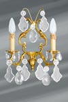 Louis XV Bohemian crystal two-light gold wall light. Lucien Gau. 