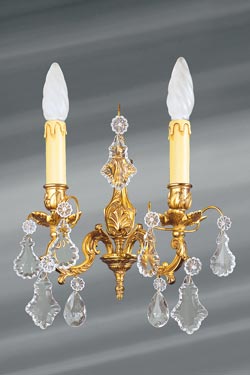 Louis XV bronze and bohemian crystal sconce. Lucien Gau. 
