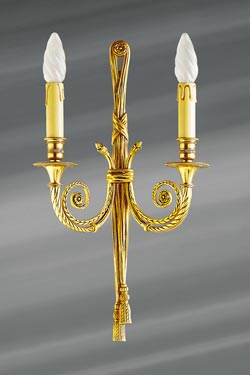 Louis XVI wall sconce old gold finish, double candlestick.. Lucien Gau. 