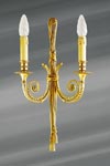 Louis XVI wall sconce old gold finish, double candlestick.. Lucien Gau. 