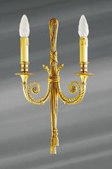Louis XVI wall sconce old gold finish, double candlestick.. Lucien Gau. 