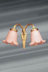 Romantic double wall lamp in gilt bronze . Lucien Gau. 