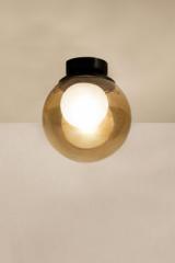 Pop ceiling lamp with amber glass ball. Luz Difusion. 