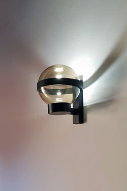 Barcino wall lamp with smoked glass ball. Luz Difusion. 