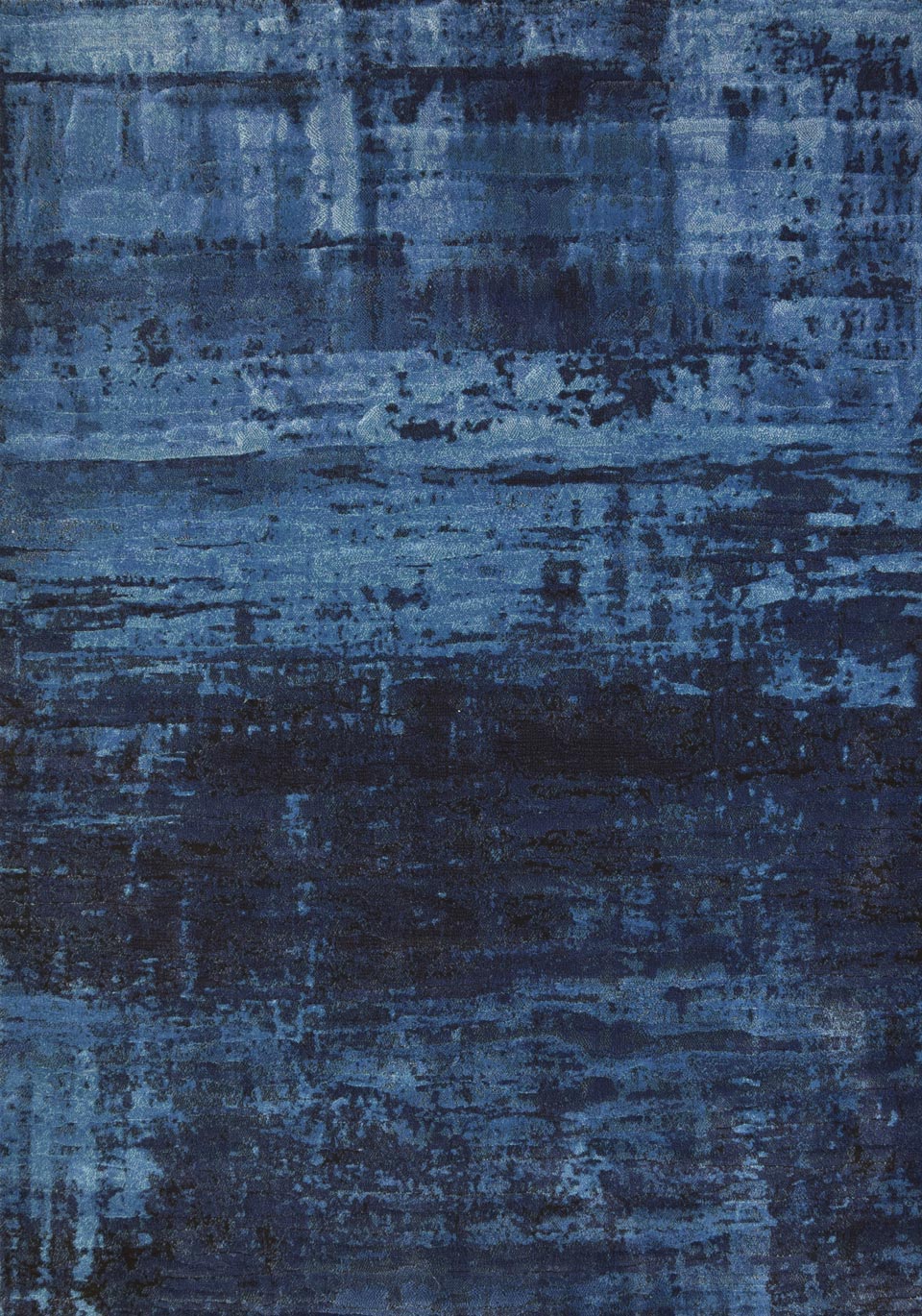 Tapis bleu collection Monetti en camaïeu bleu pixellisé 80X150. MA Salgueiro. 