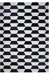 Tapis en peau à motifs géométriques noirs et blancs 140X200. MA Salgueiro. 