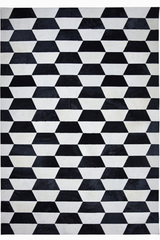 Tapis en peau à motifs géométriques noirs et blancs 140X200. MA Salgueiro. Tapis en peau à motifs géométriques noirs et blancs 140X200. MA Salgueiro.
