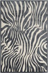 Tapis soyeux imitation peau de zèbre beige et noir 140X200. MA Salgueiro. Tapis soyeux imitation peau de zèbre beige et noir 140X200. MA Salgueiro.