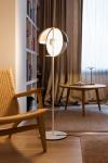 Theia floor lamp, LED lighting and half-shell shade with dimmer switch in black metal. Marset. 