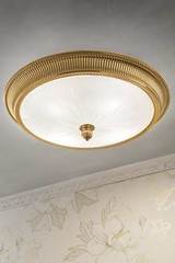 Large round gold-plated bronze ceiling light. Masiero. 