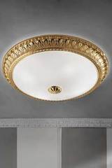 Large round gold-plated bronze ceiling light with festoon motif. Masiero. 