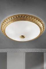 Large round gold-plated bronze ceiling light with festoon motif. Masiero. Large round gold-plated bronze ceiling light with festoon motif. Masiero.