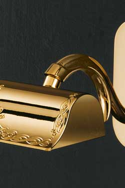 Gold-plated bedside wall light with engraved pattern. Masiero. 