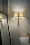 Matt old-gold and crystal wall light with cream shades. Masiero. 