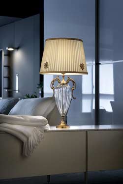 Table lamp with fluted clear crystal base and antique-gold fittings. Masiero. 