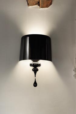 Very large Eva wall lamp in black lacquered resin and polyurethane. Masiero. 