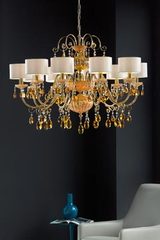 Lustre cristal orange et métal doré antique 10 lumières. Masiero. Lustre cristal orange et métal doré antique 10 lumières. Masiero.