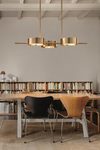 Long golden pendant light 3 lights Sound. Masiero. 