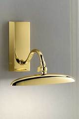 Elliptical polished gold-plated LED picture light . Masiero. Elliptical polished gold-plated LED picture light . Masiero.