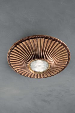 Round spotlight in antique brass. Masiero. 