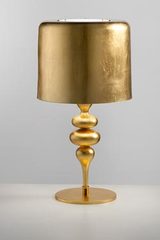 Eva table lamp in resin and golden polyurethane. Masiero. 