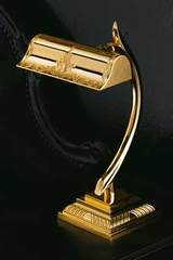 Gold-plated bedside lamp with engraved pattern. Masiero. 