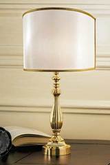 Gold-plated bronze table lamp with pale-beige shade. Masiero. Gold-plated bronze table lamp with pale-beige shade. Masiero.