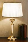 Gold-plated bronze table lamp with round base. Masiero. 