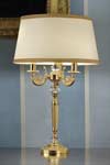 Gold-plated metal table lamp with crystal details . Masiero. 